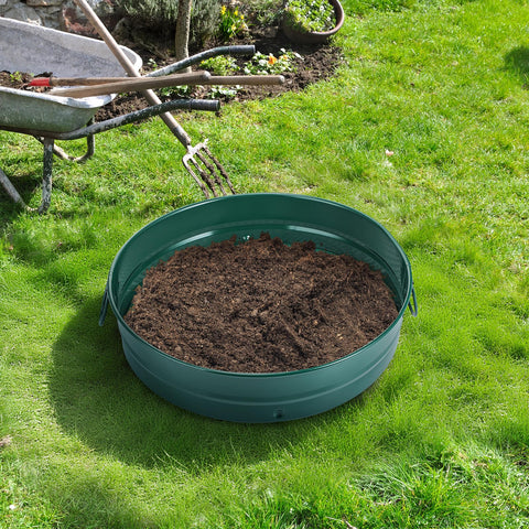 Funnymoom green garden sifter in use for soil and rocks