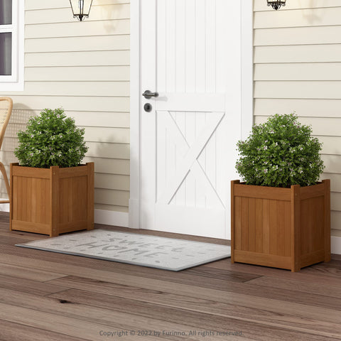Tioman flower boxes with teak oil finish resist moisture for garden décor.