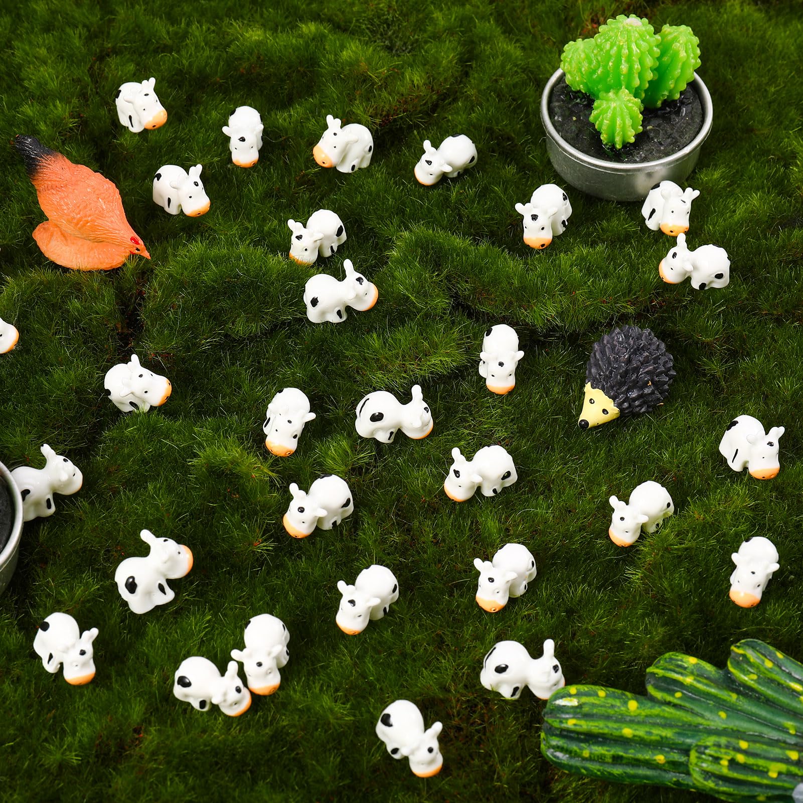 Fuyamp resin cows for outdoor display with weather-resistant charm.