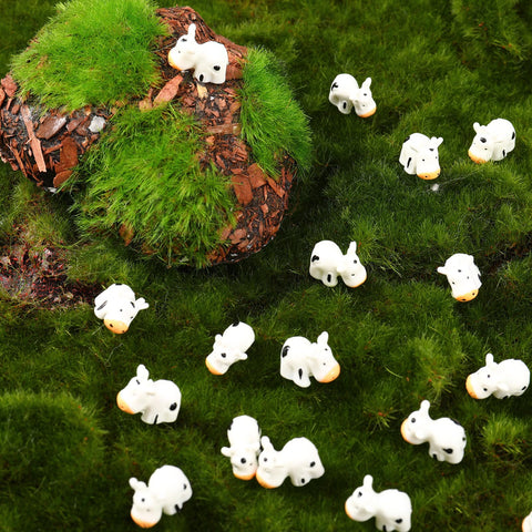Small resin cows ideal for bonsai and miniature landscapes.