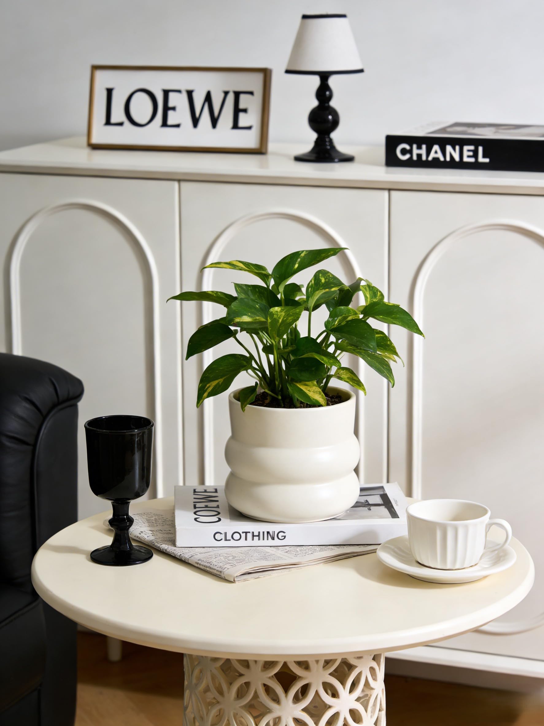 FUYHE 6-inch ceramic planter with opening showcases easy planting and growth.