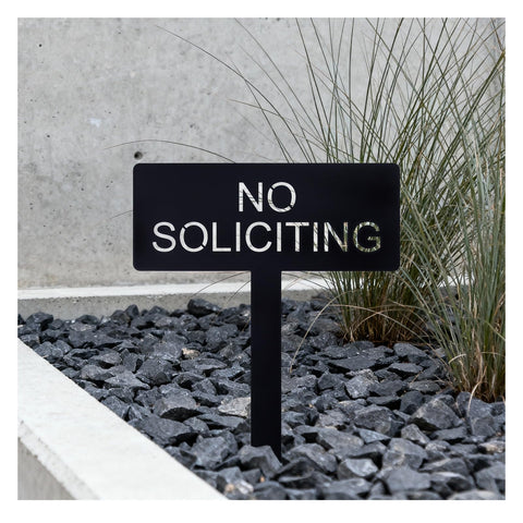 Fynleka No Soliciting sign front view in the yard with clear boundary messaging.