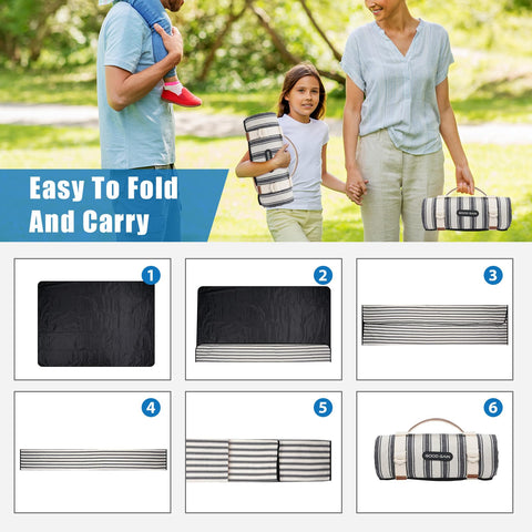 G GOOD GAIN beach-ready blanket offers soft seating on sandy shores.