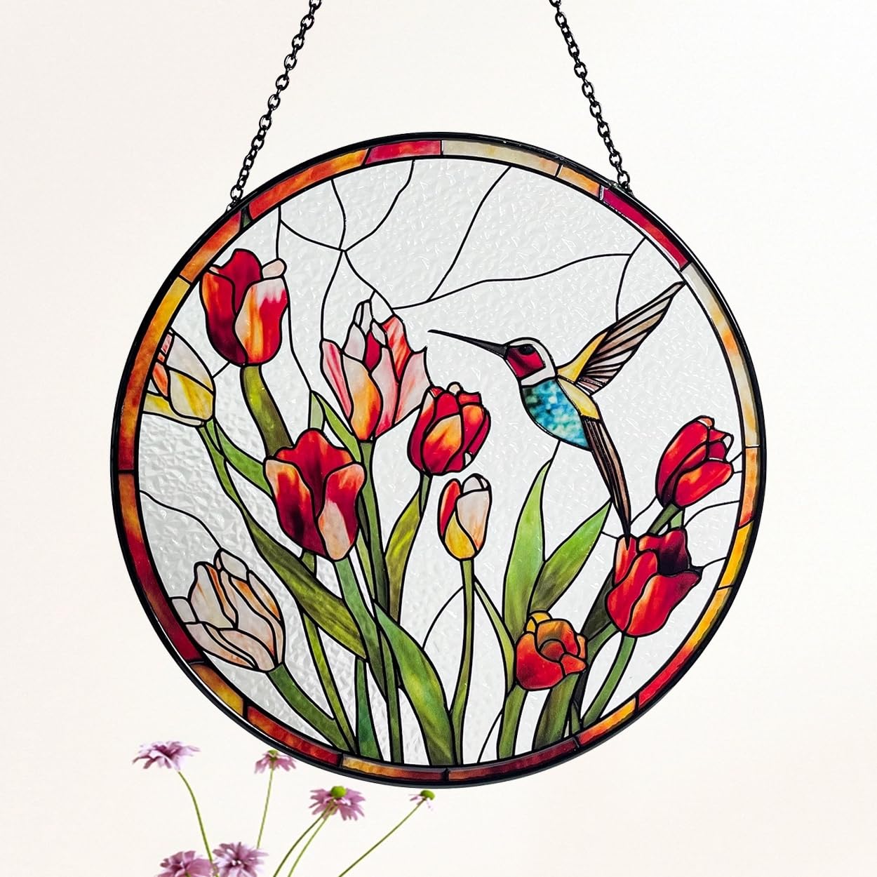 Galag hummingbird and tulips stained-glass suncatcher close-up showcases real glass craftsmanship.