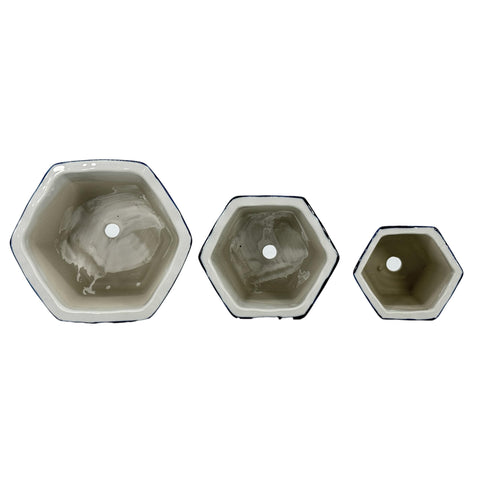 Galt International planter with drainage holes supports healthy watering.