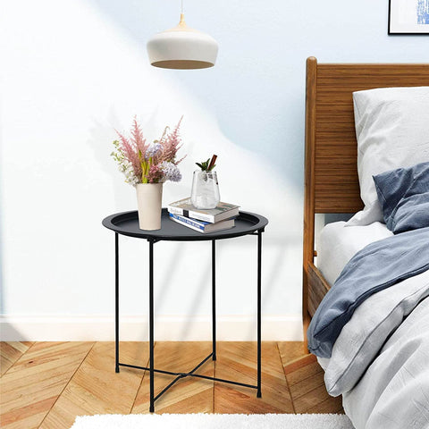 Garden 4 you small-space end table keeps living room tidy.
