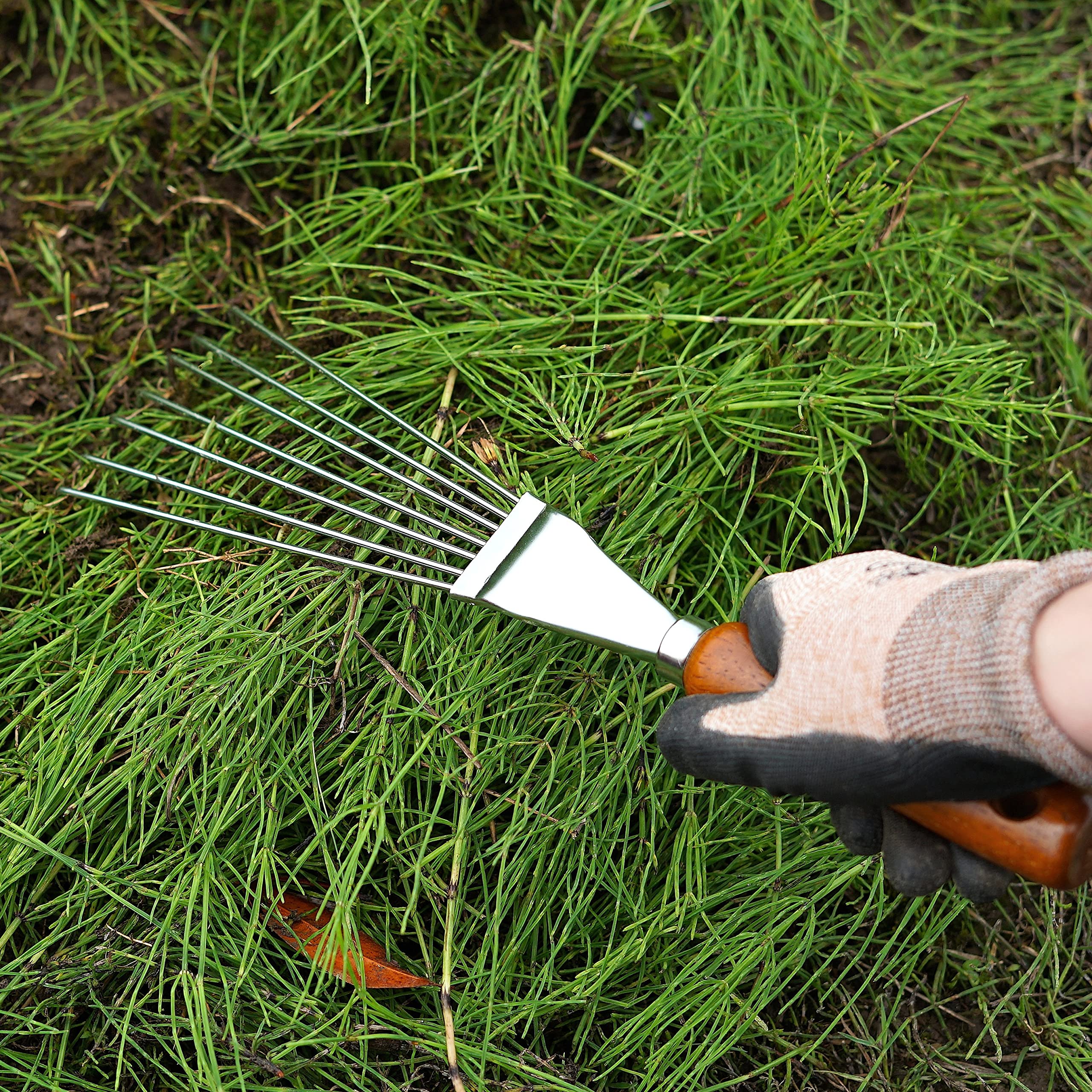 Garden Helper hand rake wooden handle grip for comfortable, steady use.