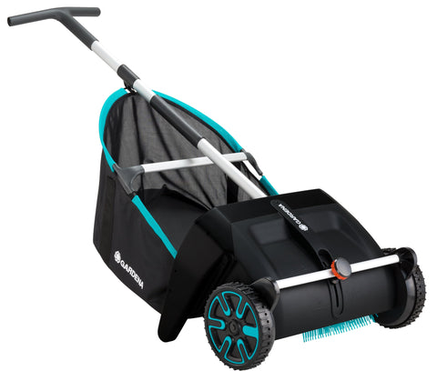 Gardena lawn sweeper in action showing easy push operation on grass