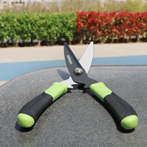 GardenWORK 16-inch hedge shears shown in use for shaping hedges and shrubs.