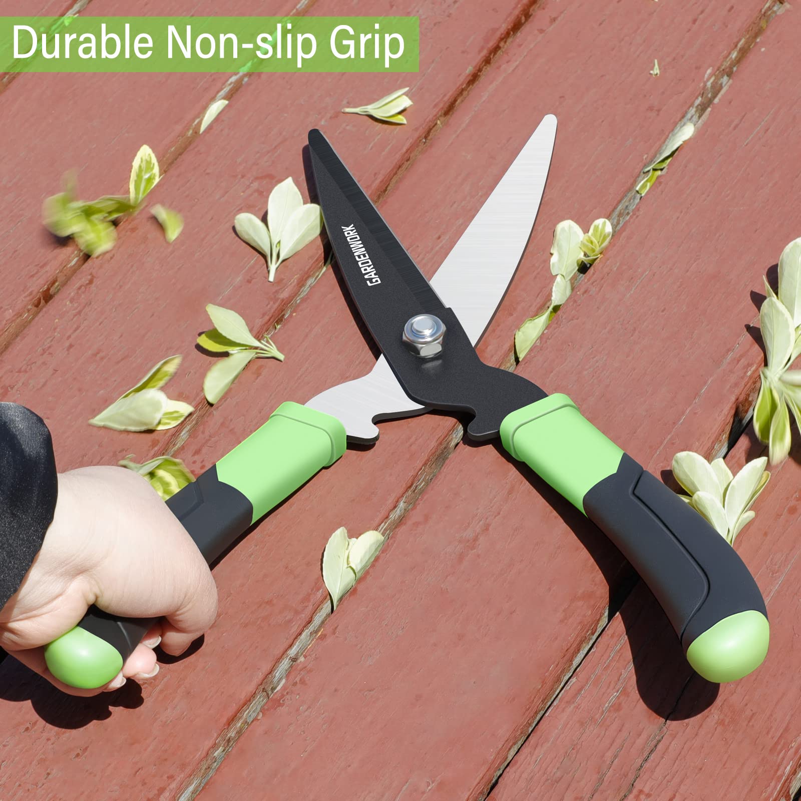 GardenWORK shears trimming boxwood and shrubs along a tidy garden path.
