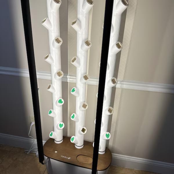 Gardyn pod caps white set 10 nutrient protection by minimizing exposure to air and light.