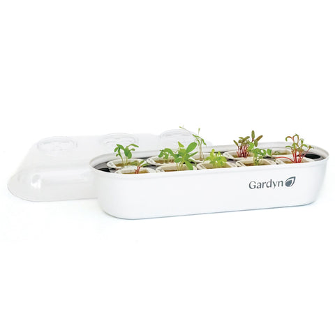 Gardyn seed starter tray base for germination in a compact hydroponic system.
