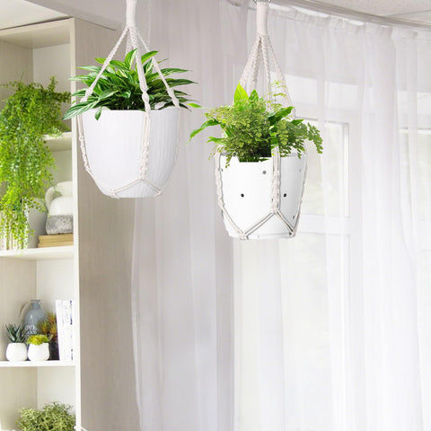 Garini indoor outdoor hanger with flexible fit for different planter shapes.