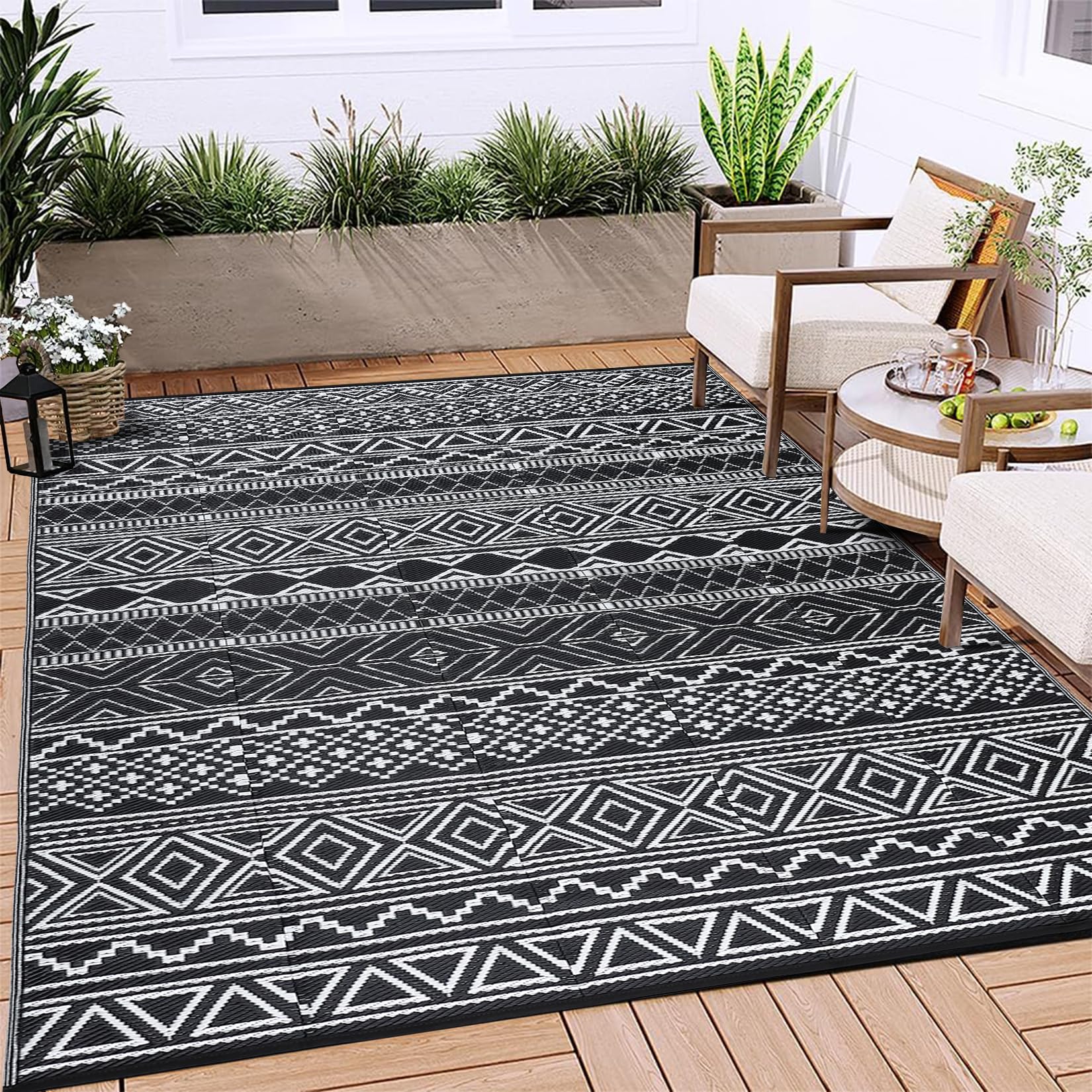Garvee 8x10 waterproof outdoor rug on patio, fade-resistant for sunny days.
