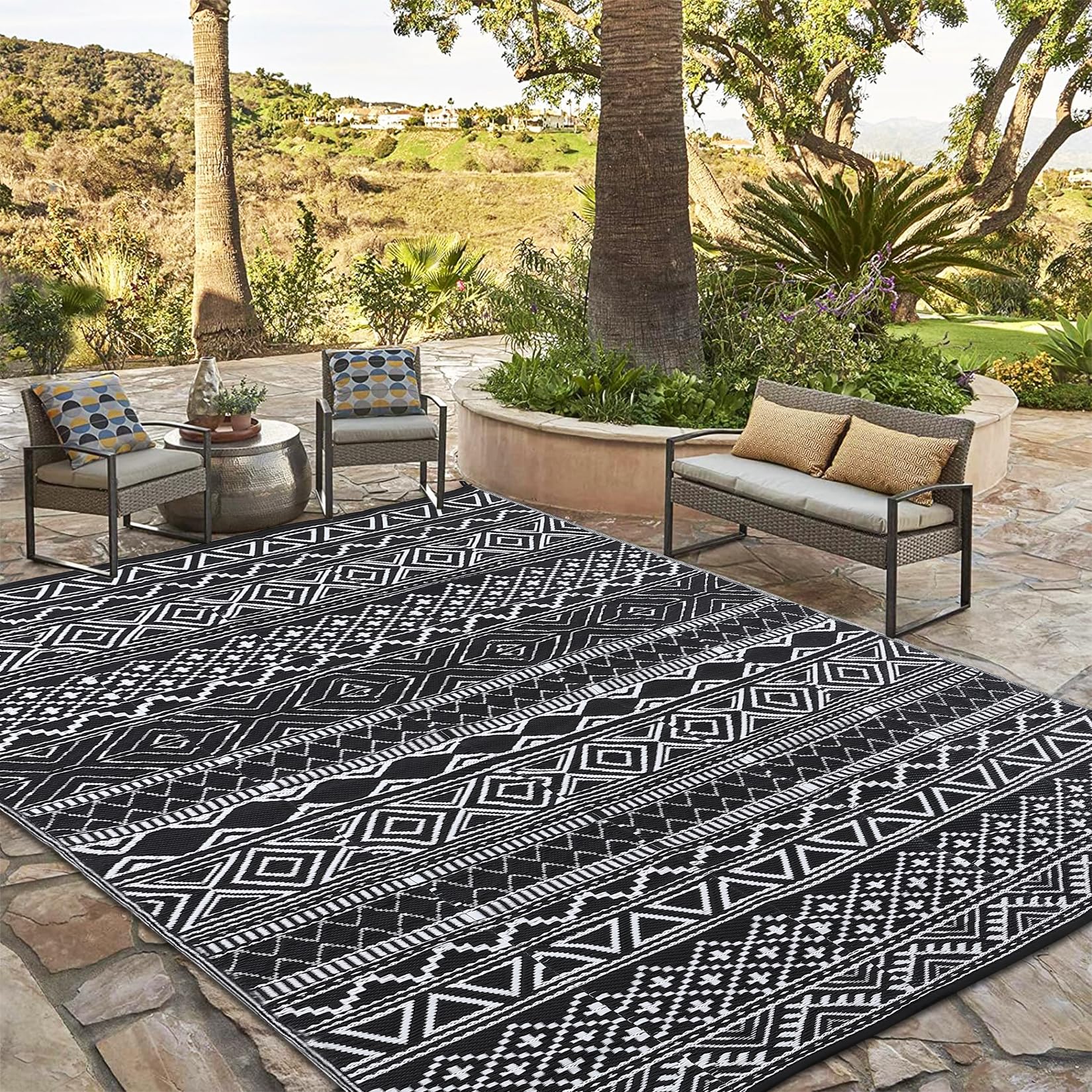 Garvee outdoor rug on deck highlighting fade-resistant color and easy maintenance