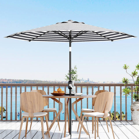 Garvee premium polyester fabric on patio umbrella resists fading and rain.