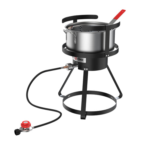 Gas One 10qt pot with strainer basket for even deep frying outdoors.