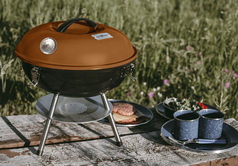 Gas One portable grill in outdoor setting ready for backyard or camping use