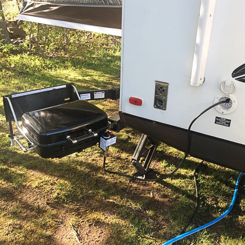 GASPRO outdoor cooking setup with propane hose for fire pits and portable grills.