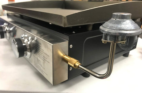 GasSaf griddle regulator connected to a 1-pound propane tank for portable grilling.