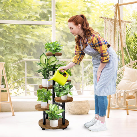Geebobo indoor plant stand in brown finish elevates living room decor with mobility.