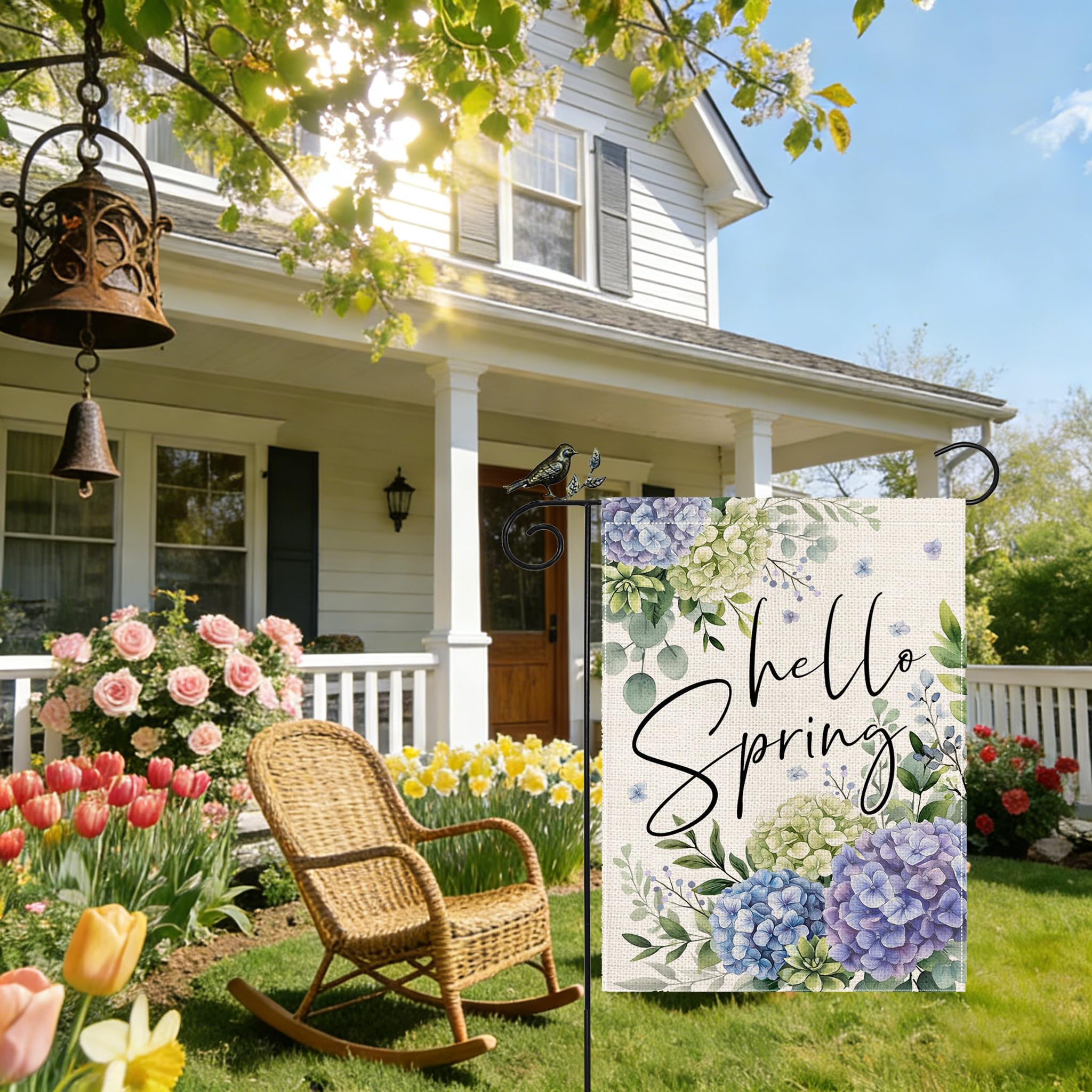 GEEORY Hello Spring porch and garden display boosts curb appeal.