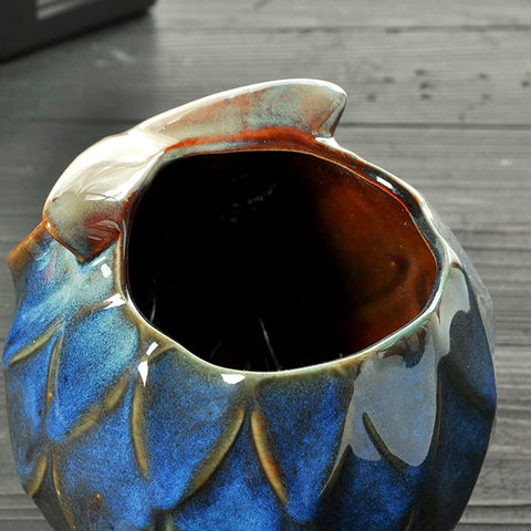 Bright blue GeLive owl planter enhances home or office spaces