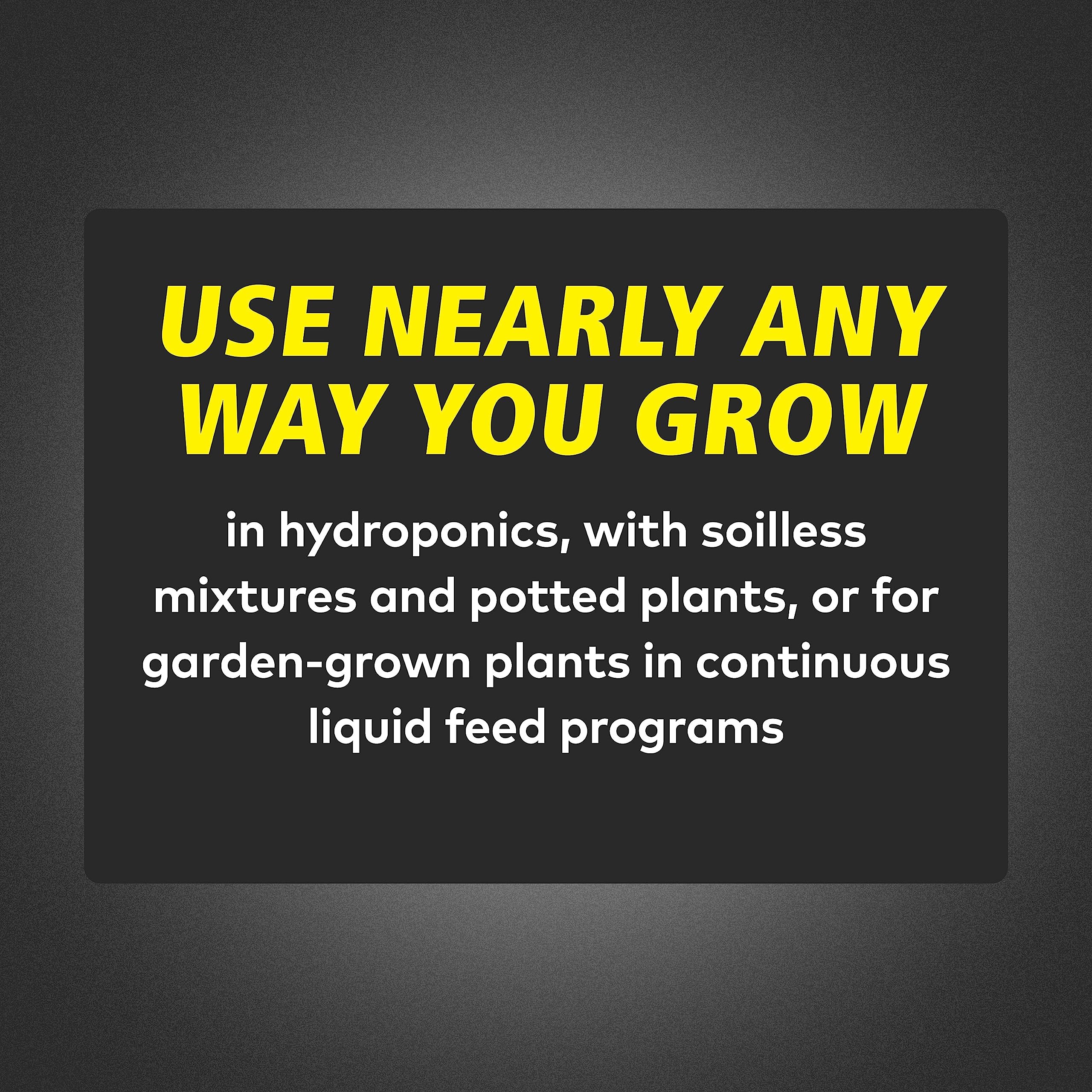 General Hydroponics FloraNova Bloom plant tag on thriving greens.