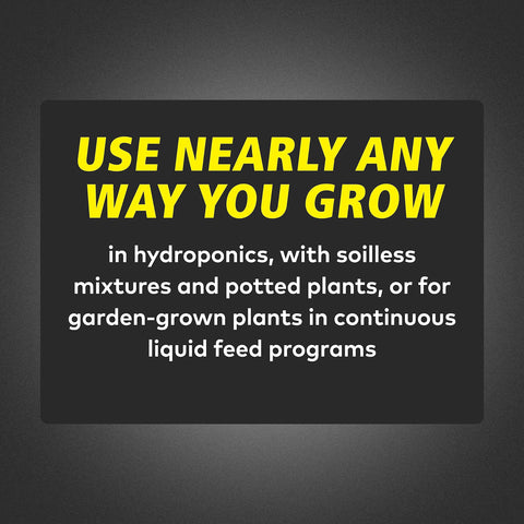 General Hydroponics FloraNova Bloom plant tag on thriving greens.
