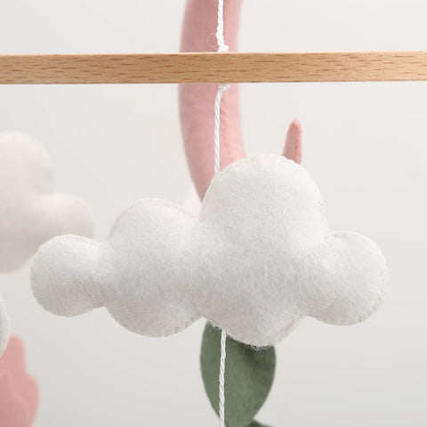 Generic Deer Hanging Mobile highlights floral accents for gentle, imaginative play.