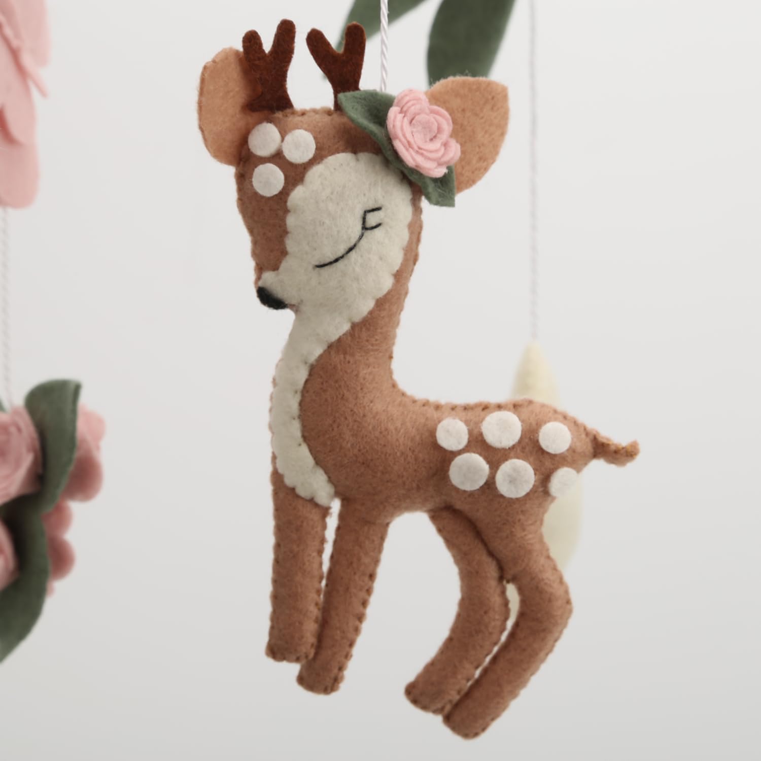 Generic Deer Hanging Mobile features soft fabrics for cozy nursery decor.