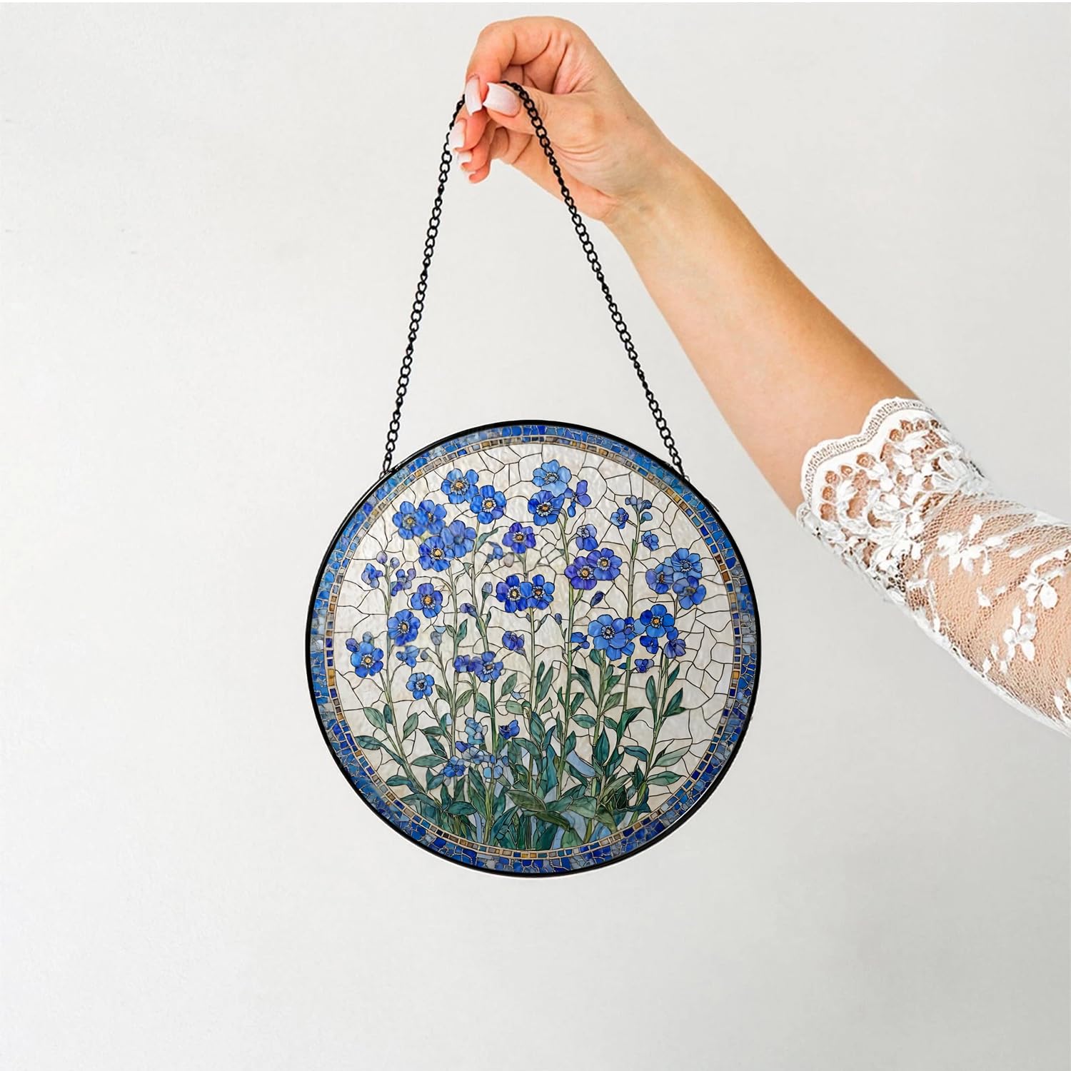 Generic Forget-Me-Not suncatcher enhances curb appeal with iridescent reflections on walls