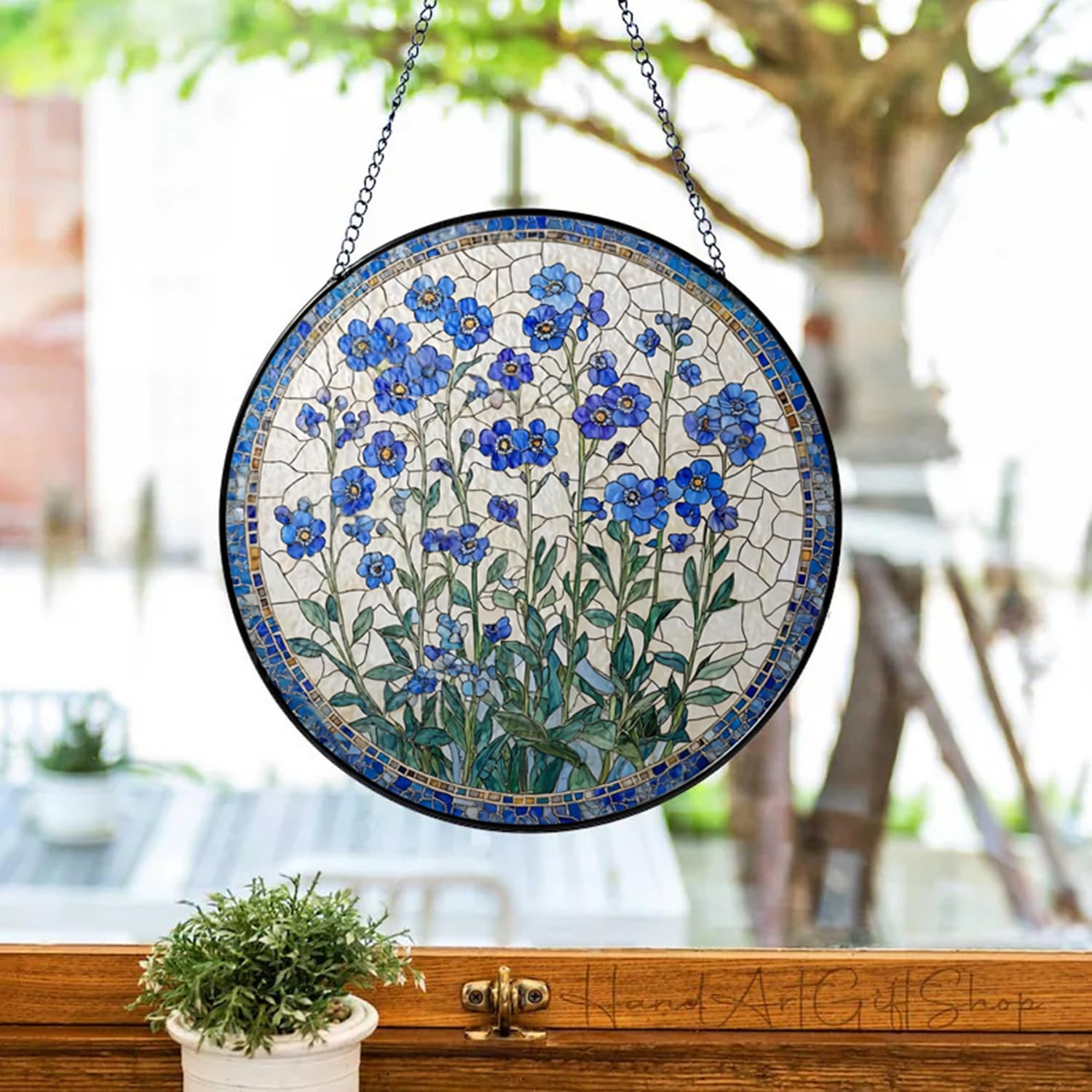 Generic Forget-Me-Not suncatcher with hooks included for easy window installation