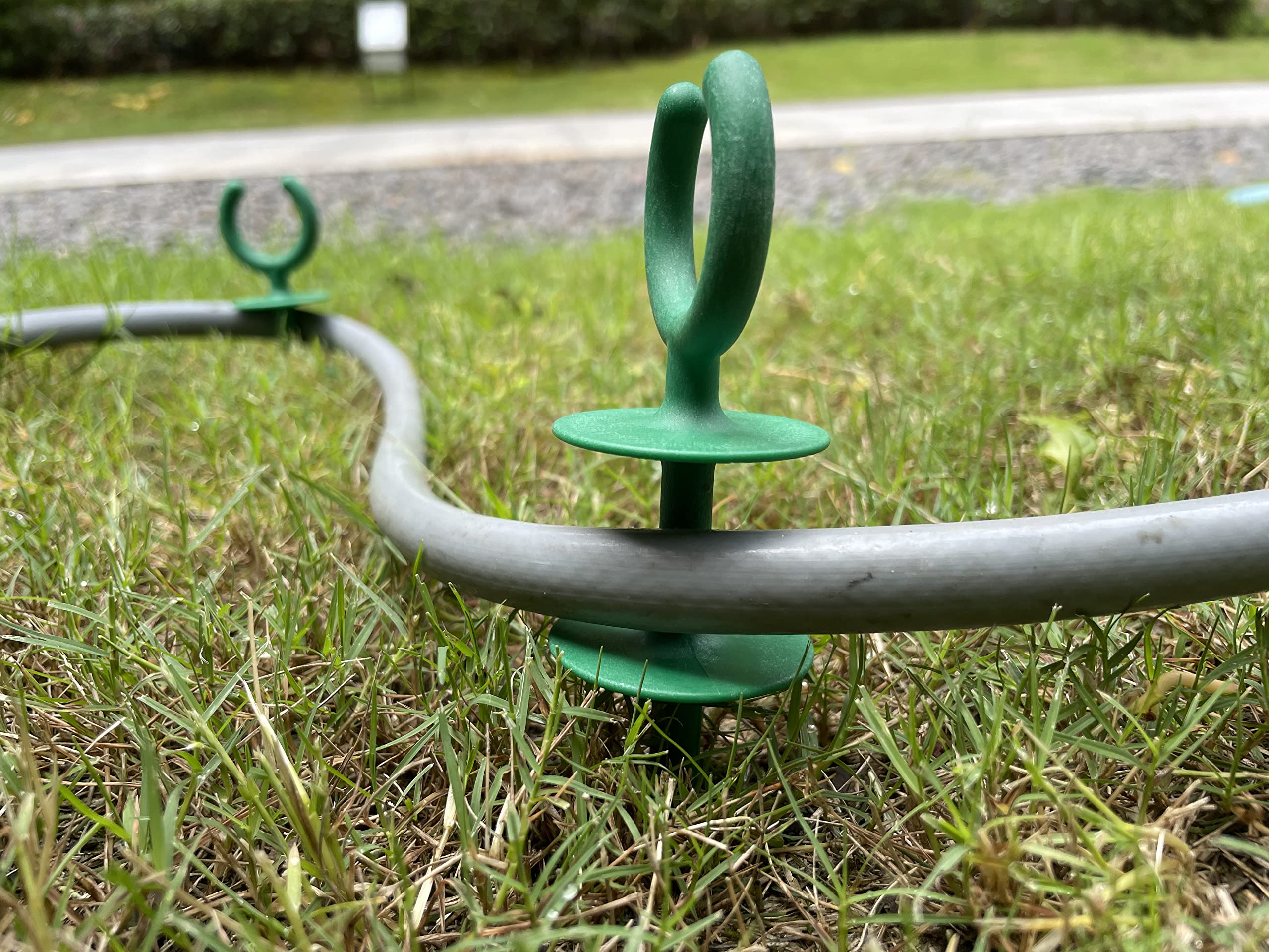 Generic garden hose guide holder nails dimension 1.77x1.77x8.26 inches.