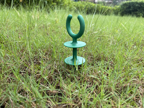 Generic garden hose guide holder nails PA66-green construction.