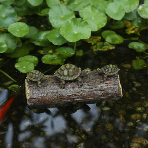 Generic Three Turtle Floating Sculptures float on a pond, enhancing outdoor water features.