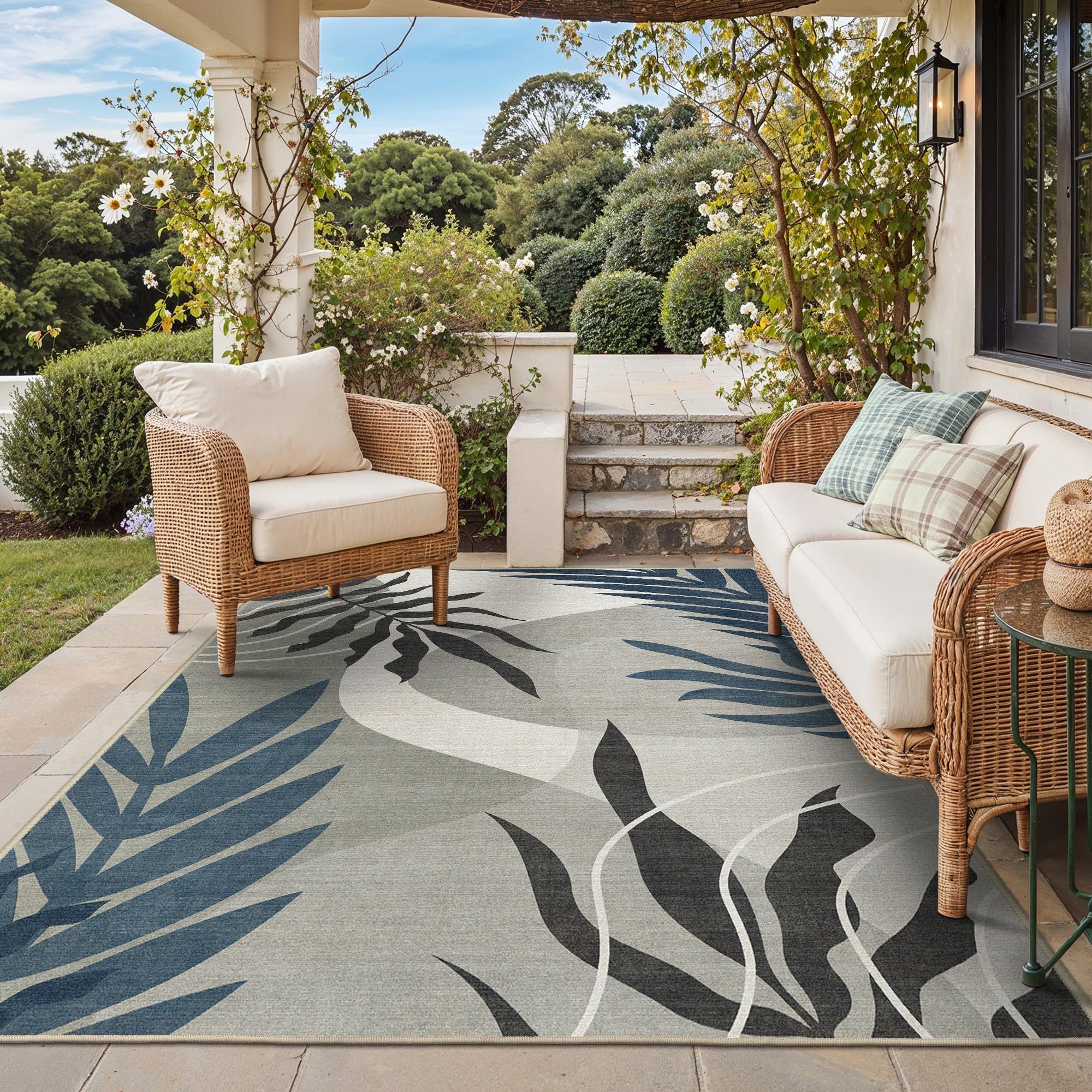 GENIMO leaf-boho rug 5x8 showcases a vibrant leaf pattern for patio or living room use.