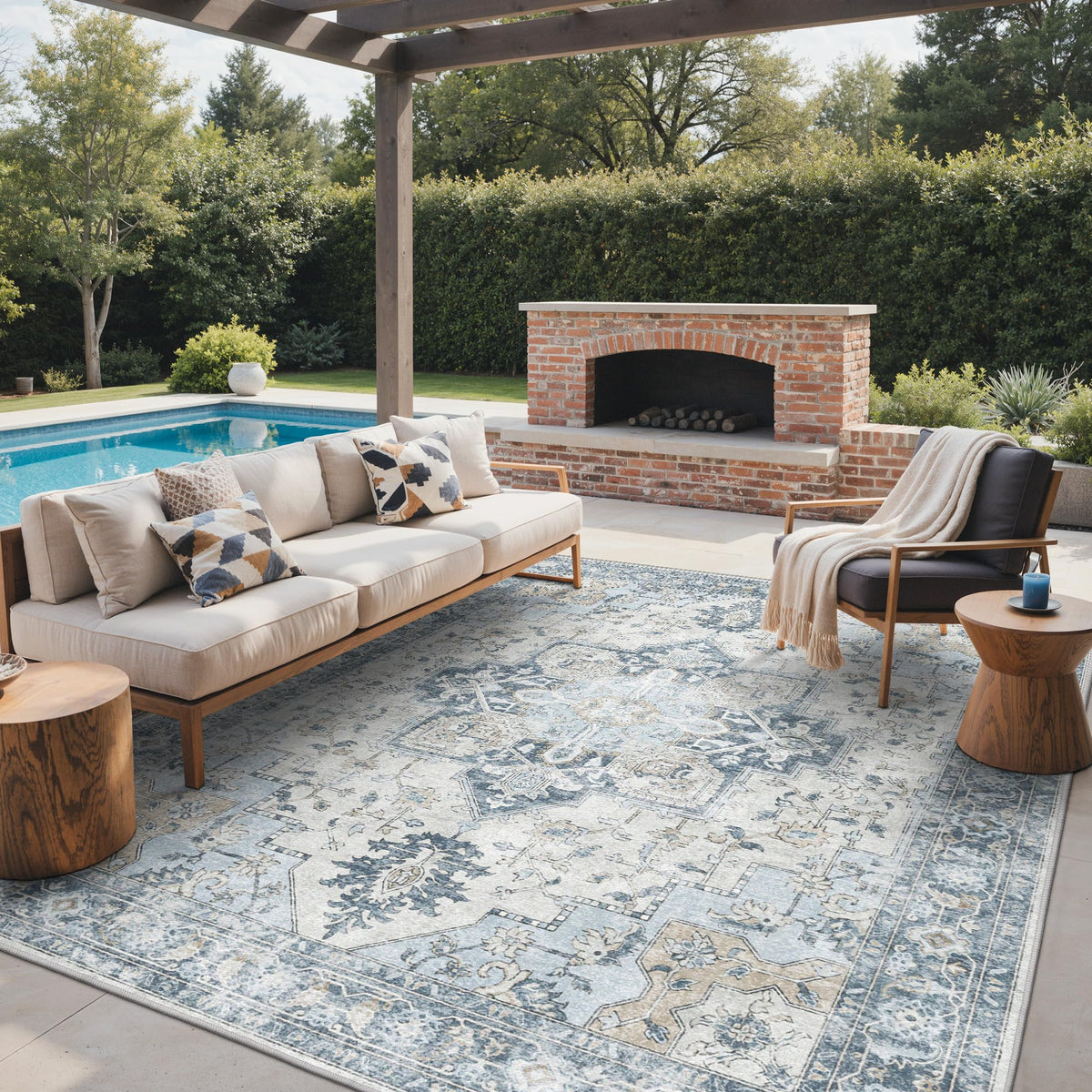 GENIMO 9x12 blue rug in a patio setting, excellent for high-traffic outdoor spaces.