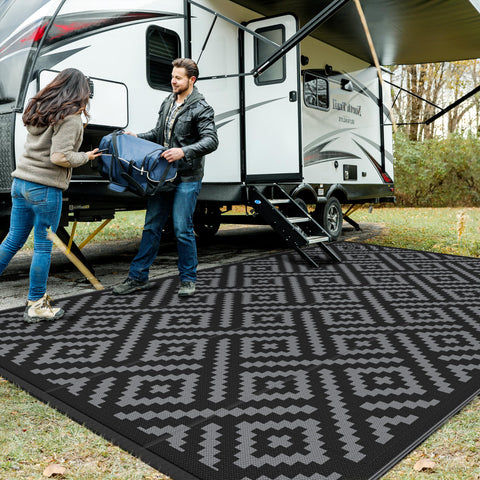 GENIMO outdoor rug 10x14 in black and grey for patios, RVs, and easy cleanup.