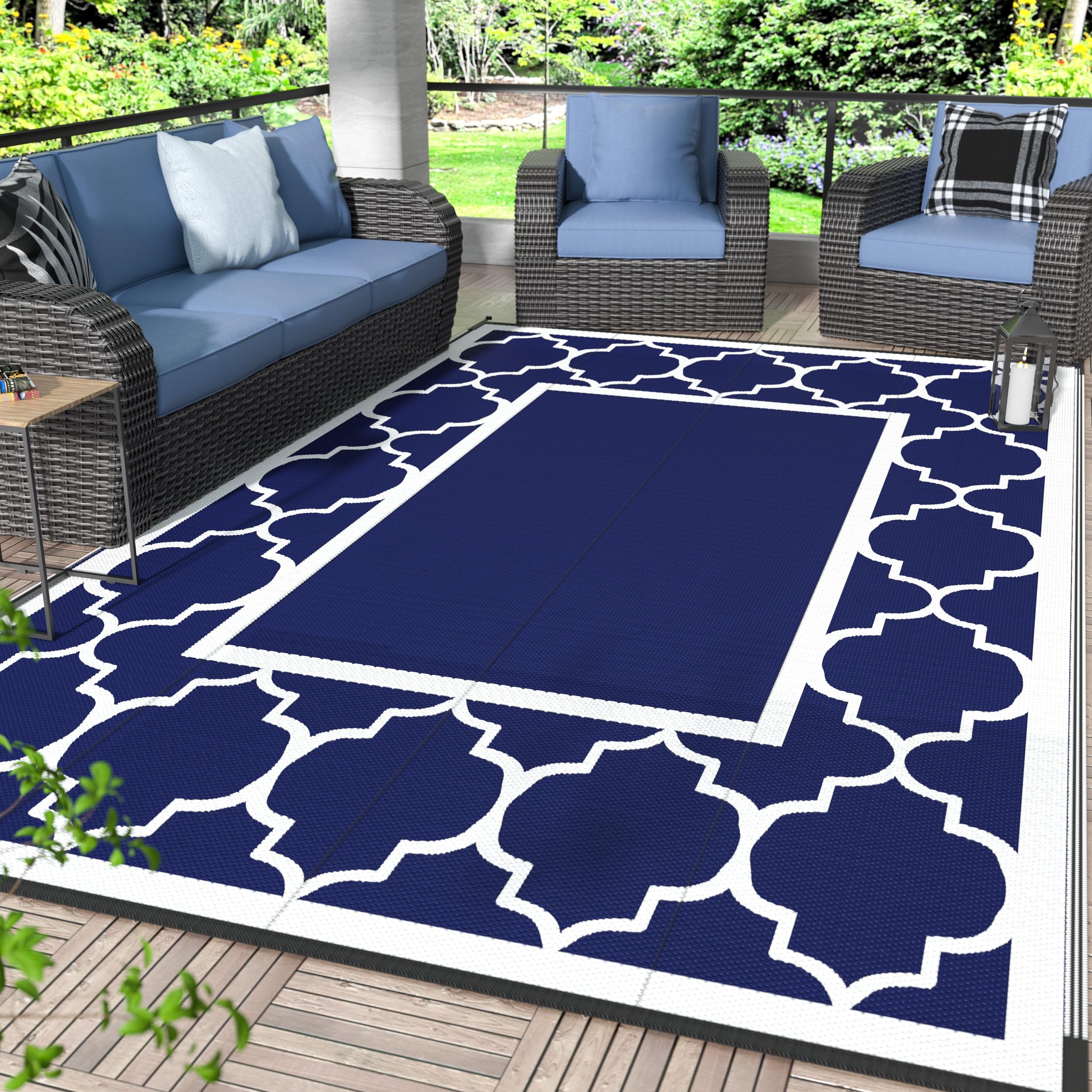 GENIMO outdoor rug 6x9 in blue and white, foldable for easy transportation.