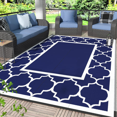 GENIMO outdoor rug 6x9 in blue and white, foldable for easy transportation.