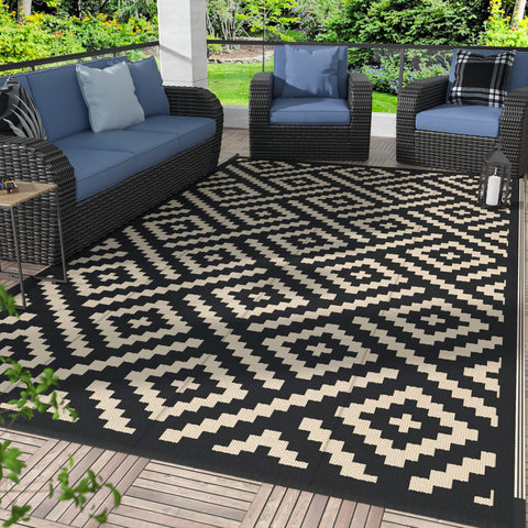 GENIMO outdoor rug 6x9 on patio setup with reversible patterns for versatile decor.