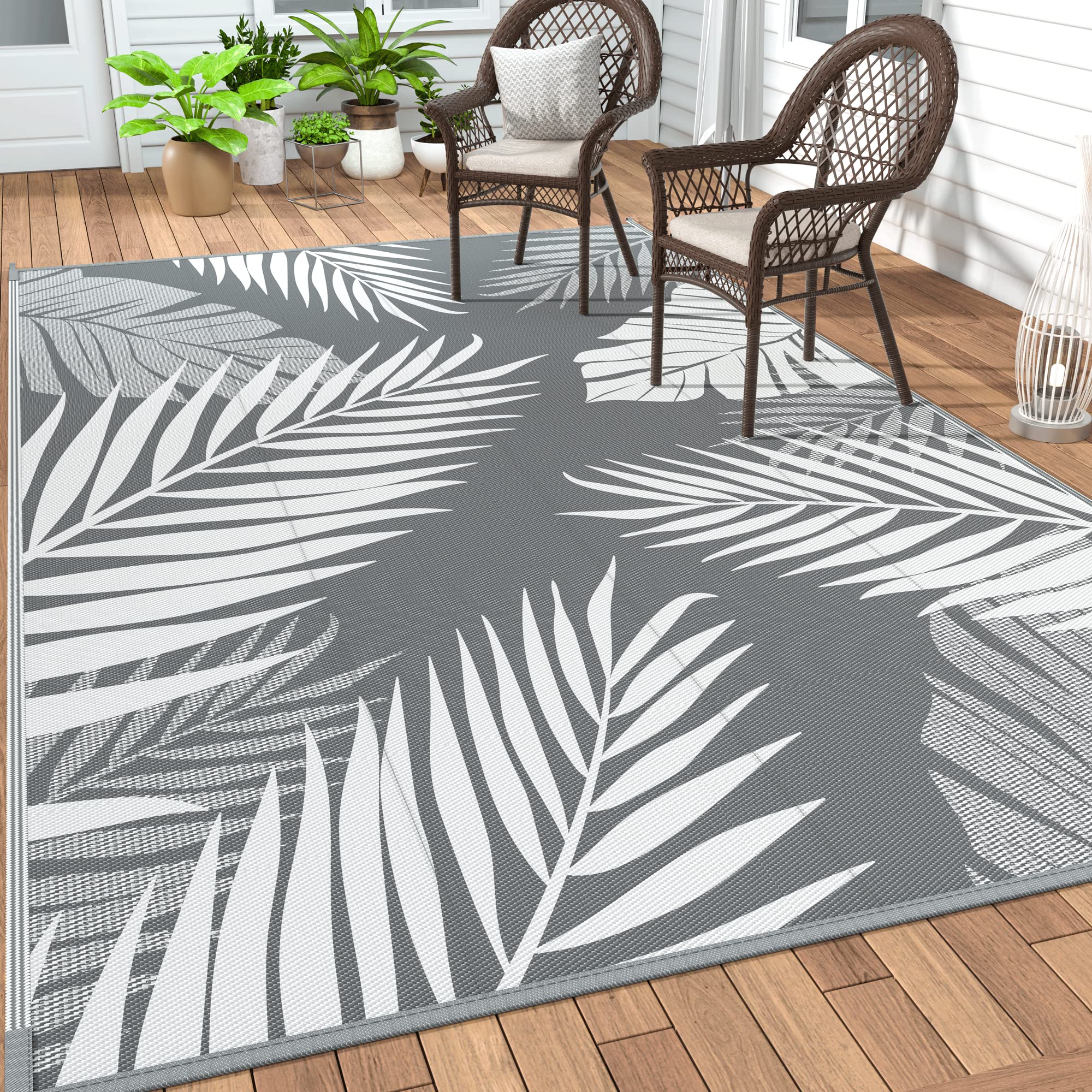GENIMO Outdoor Rug palm leaf pattern on front, ideal for patio setup with style