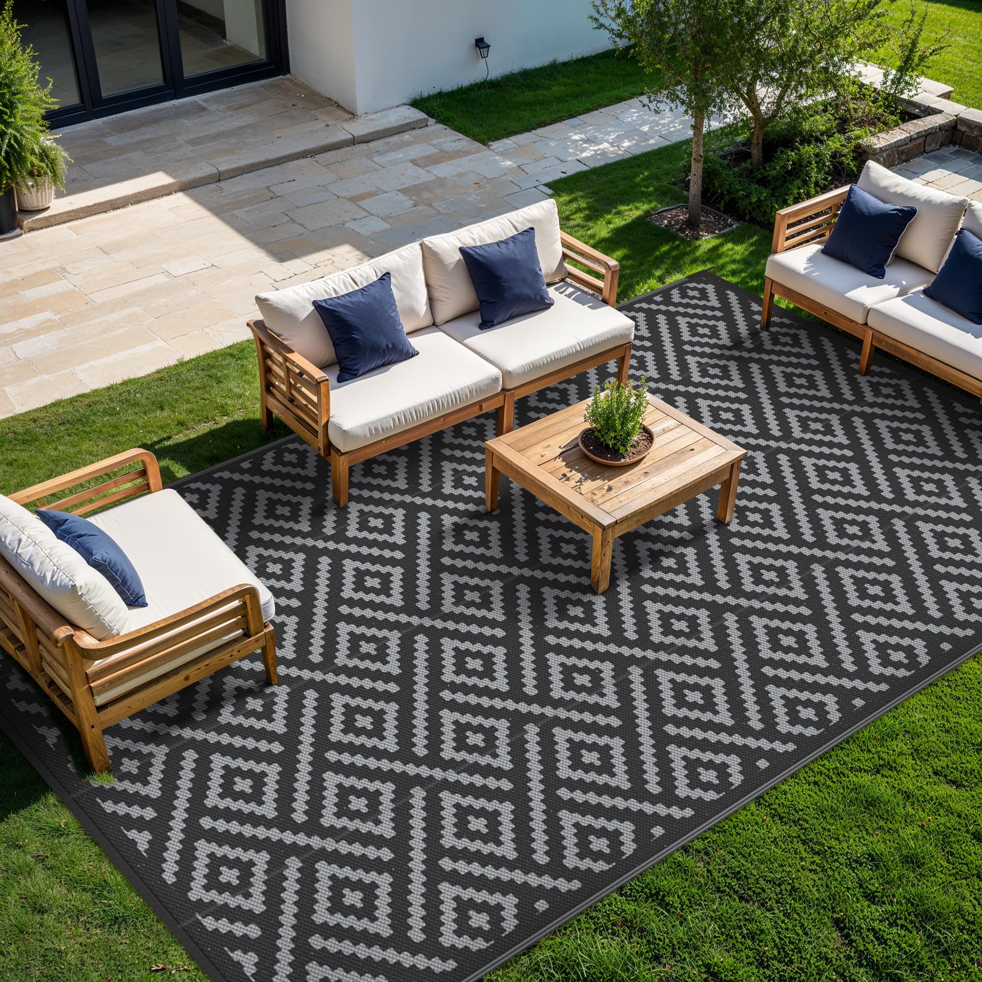 GENIMO outdoor rug dark surface hides dirt for high-traffic areas.