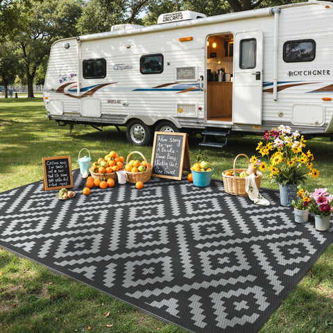 GENIMO rug with dark surface hides dirt on outdoor deck.