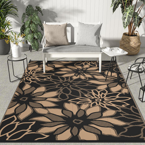 GENIMO outdoor rug with floral design on reversible sides for flexible patio styling.