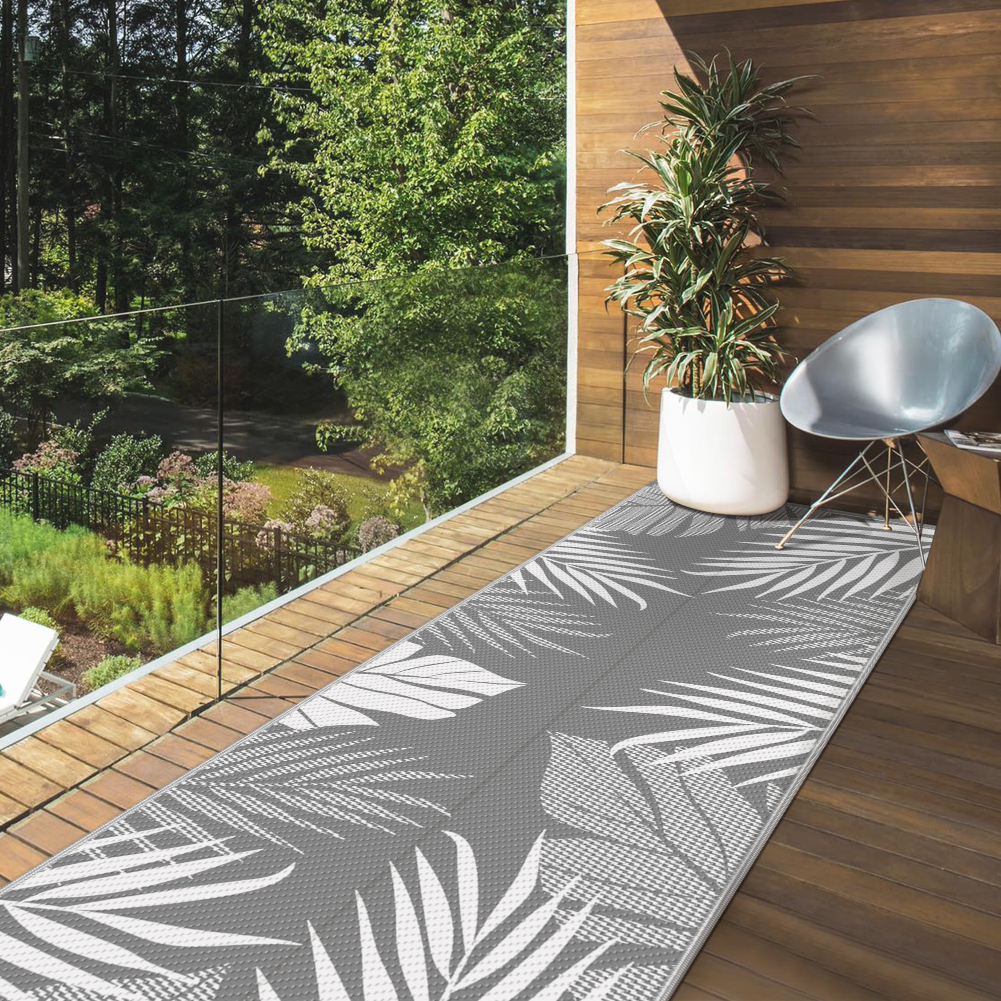 GENIMO rug folded for camping, portable and easy to carry in included bag.