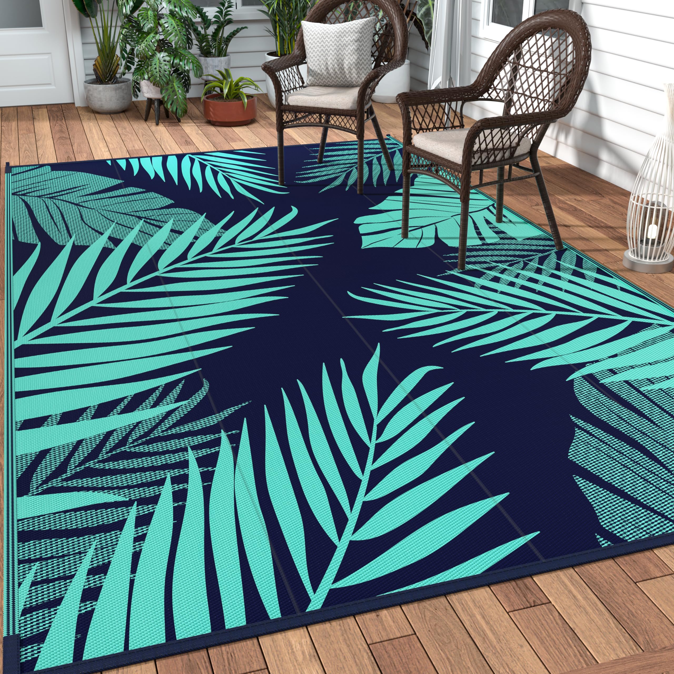GENIMO outdoor rug with palm leaf design enhances patio comfort and style