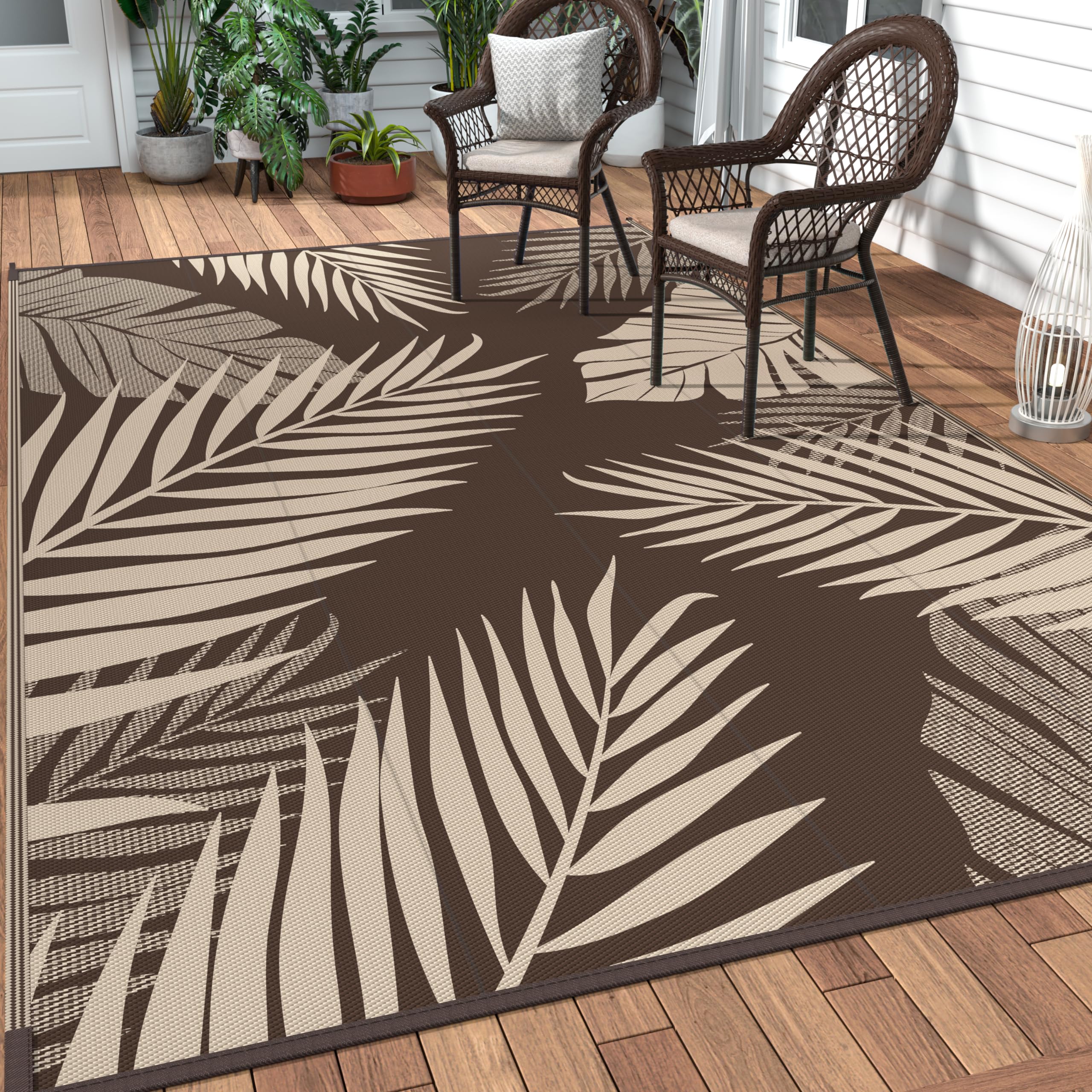 GENIMO outdoor rug with palm leaf pattern enhances patio decor and comfort