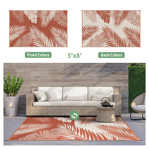 GENIMO palm leaf pattern rug adds tropical touch to yard or deck.